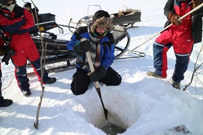 Ice Fishing on Lake Inari with Snowmobile and Sleigh